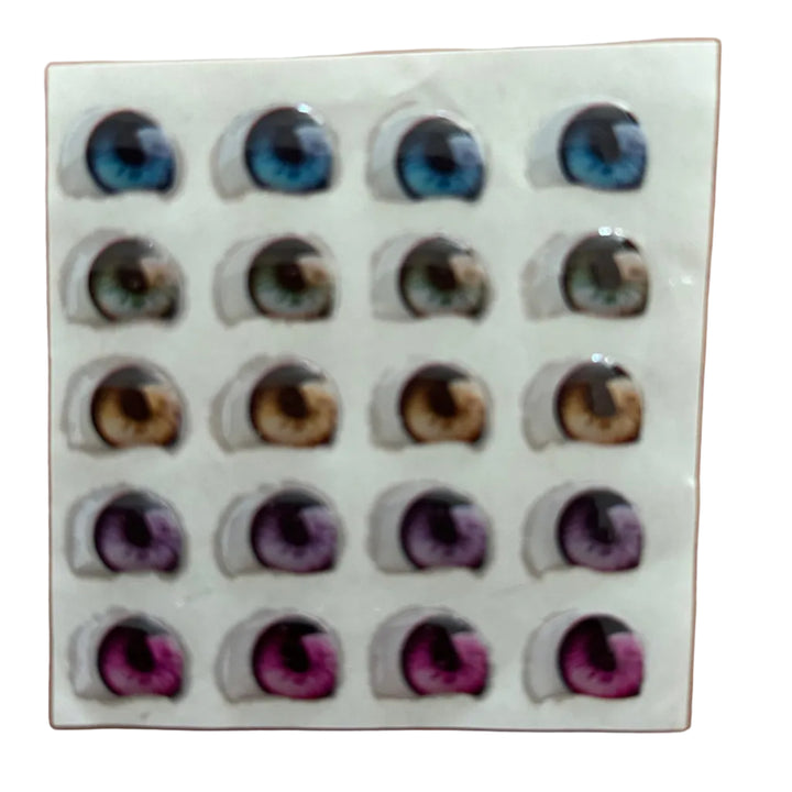 Ojitos adhesivos resinados modelo S mirada lateral efecto 3D para muñecas y figuras con expresión natural y elegante