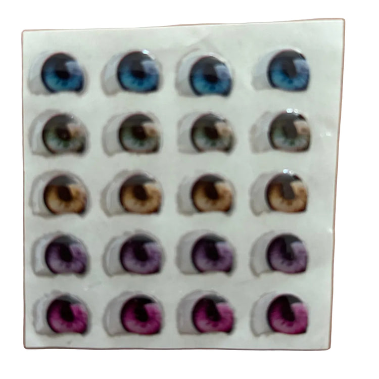 Ojitos adhesivos resinados modelo S mirada lateral efecto 3D para muñecas y figuras con expresión natural y elegante
