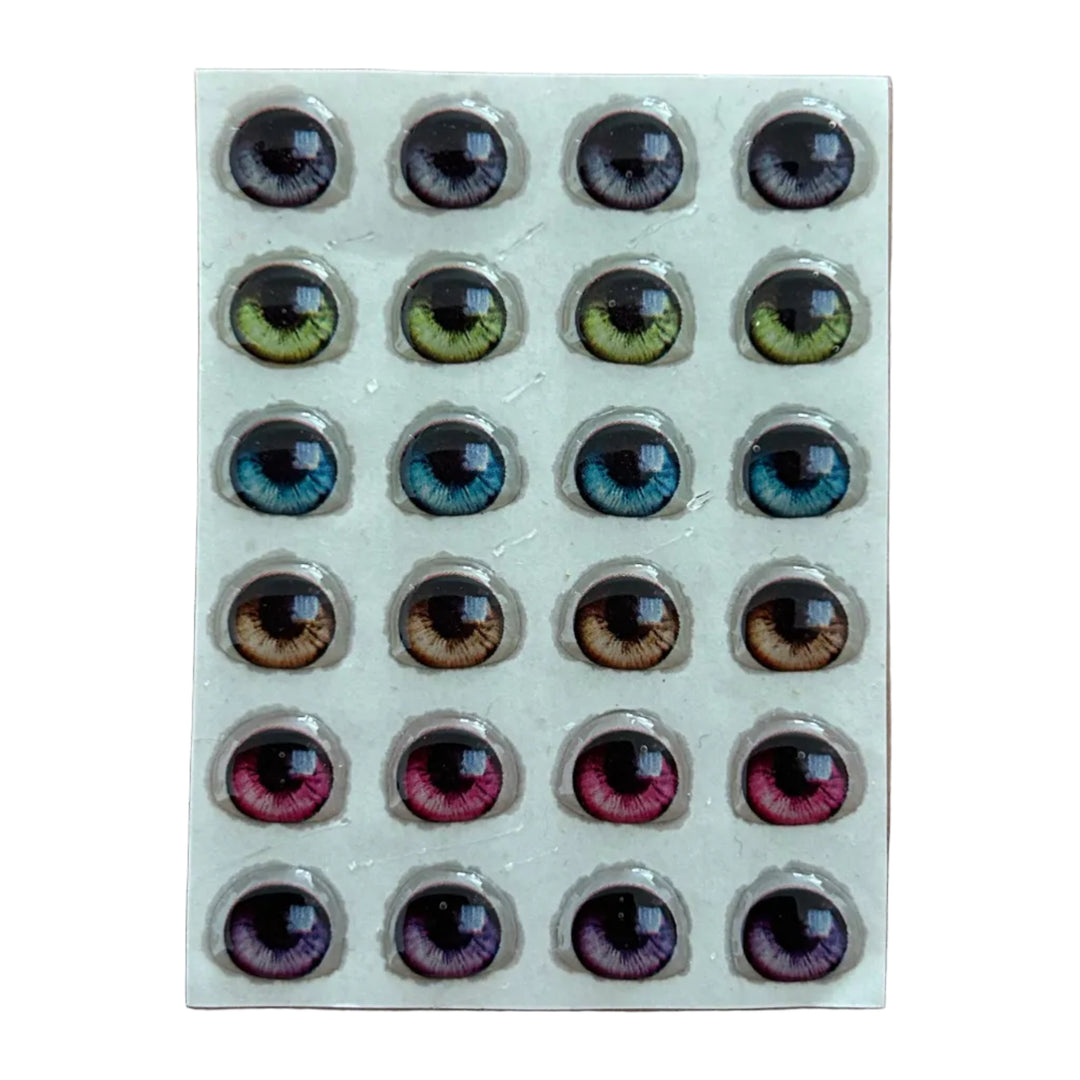Ojitos adhesivos resinados modelo Y realista intenso con iris detallado y colores vivos para muñecas y figuras artesanales