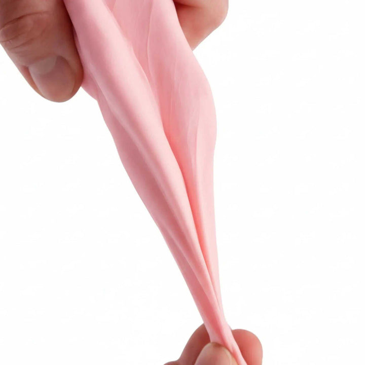Porcelana fría cremosa elástica rosa AradiaShop mostrando flexibilidad y textura para modelado